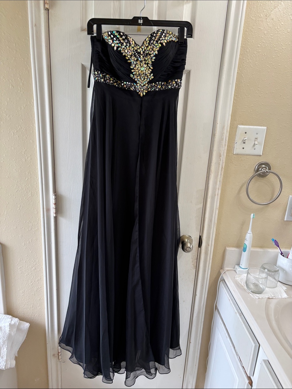 Cinderella fully lined strapless and crystal adorned maxi dress. NWT